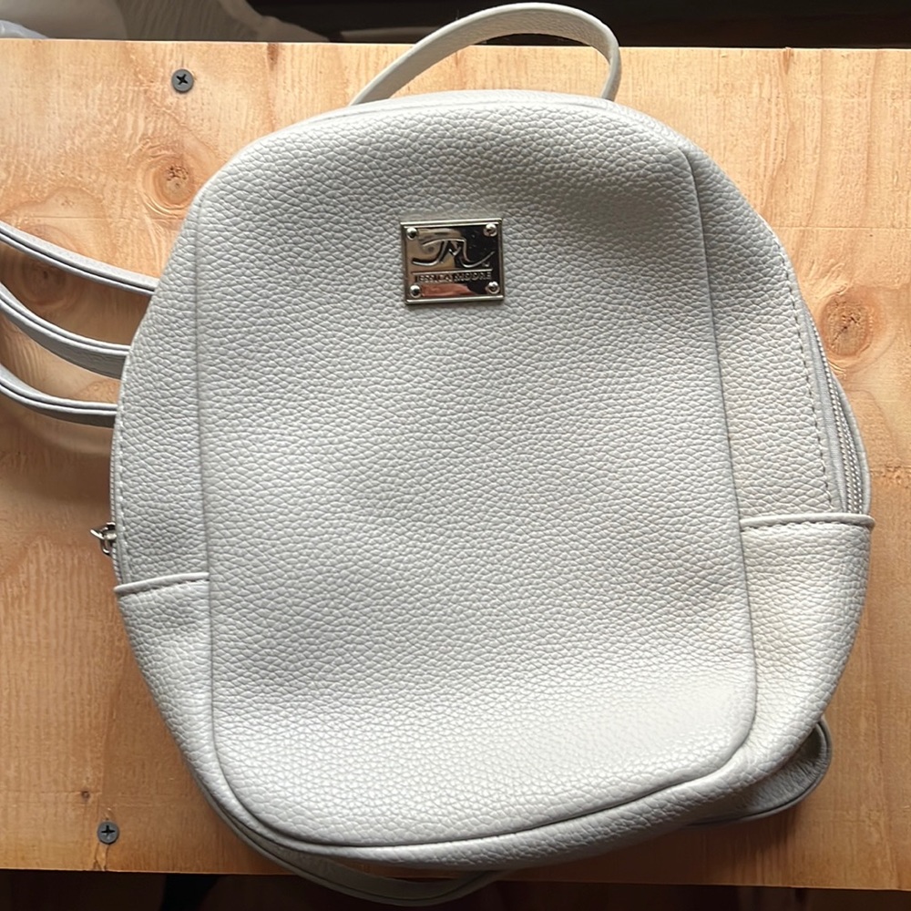 Silver Jessica Moore double strapped mini backpack